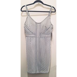 White and Black Geometric Pattern Dress Tags On